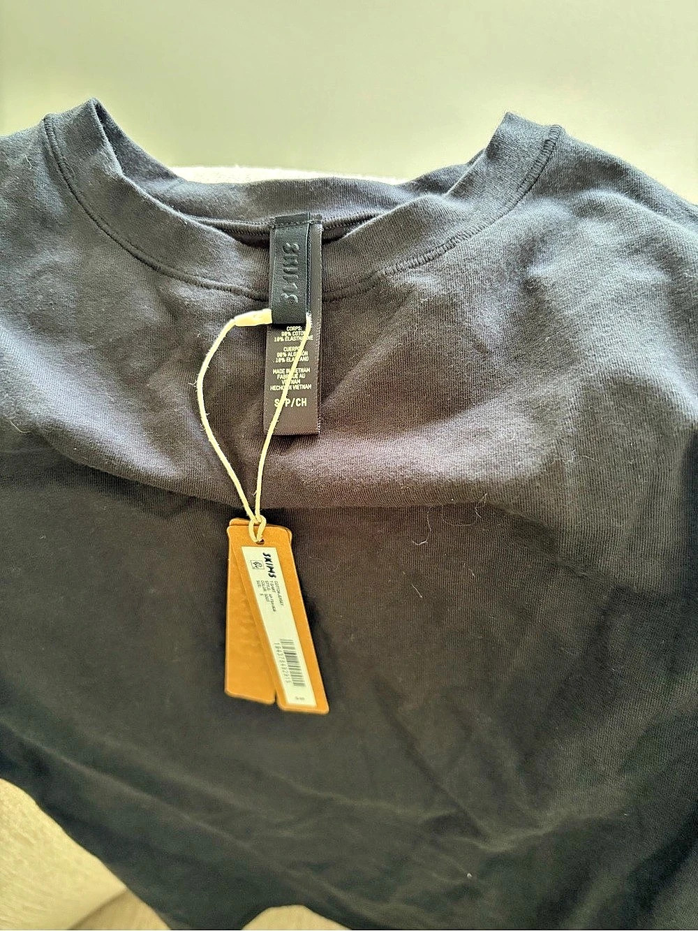 SKIMS Cotton Jersey T-Shirt in black/Onyx.